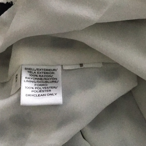 White with black dots mini skirt. - Picture 4 of 7